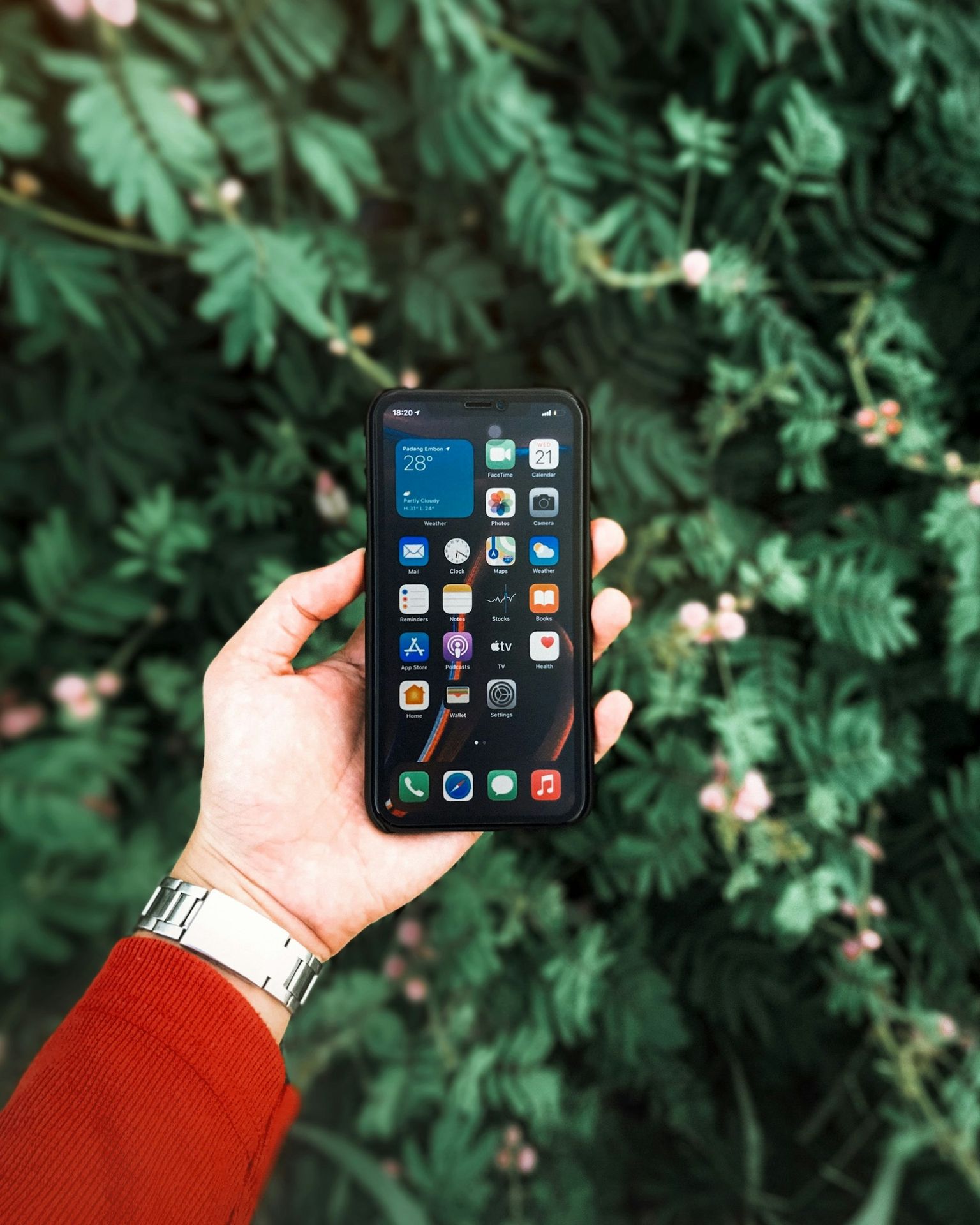 person holding black iphone 5